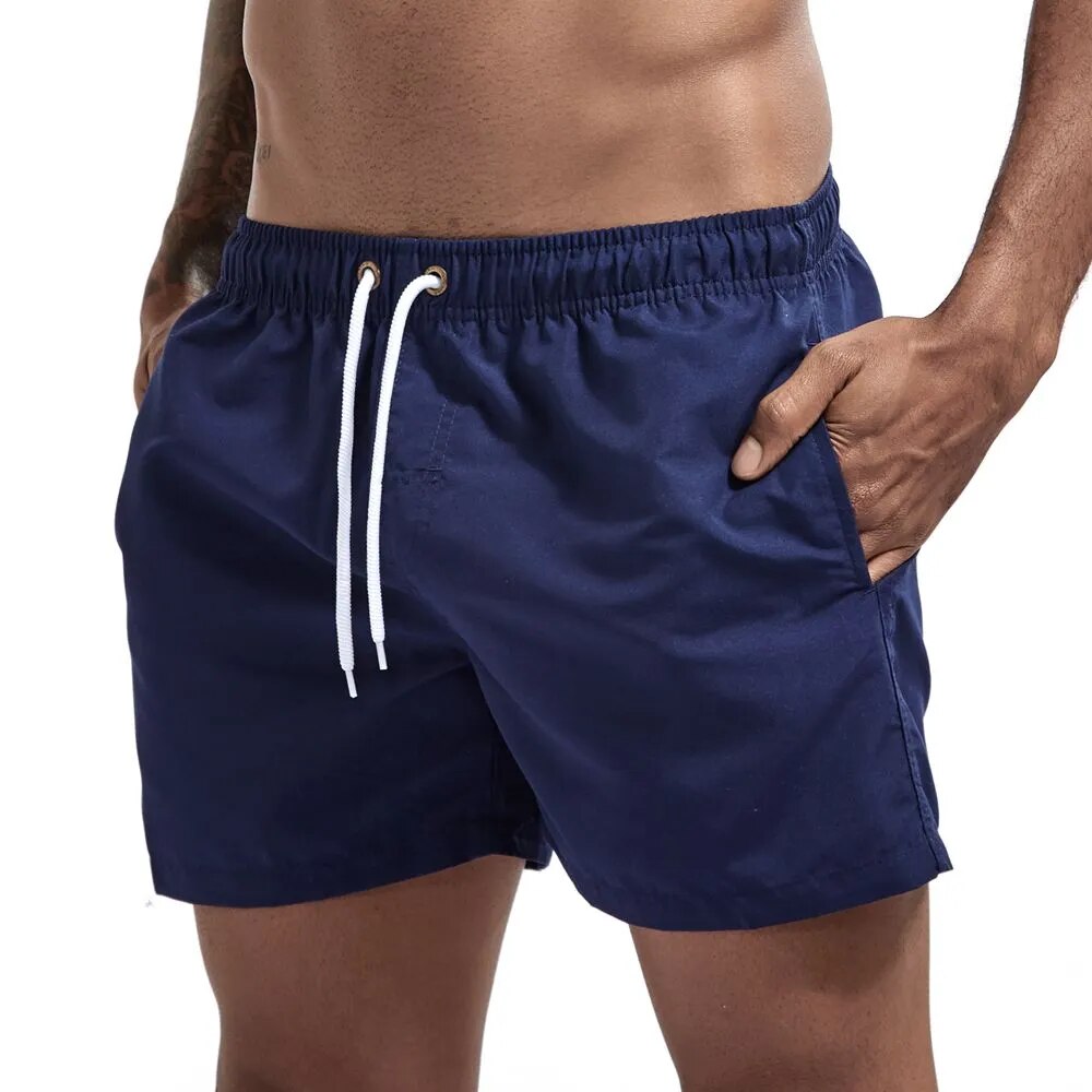 JOCKMAIL Men's Board Shorts Fast Dry 2020 Summer Holiday Beach Surf Pocket Swimming Trunks Sport Running Hybird Shorts