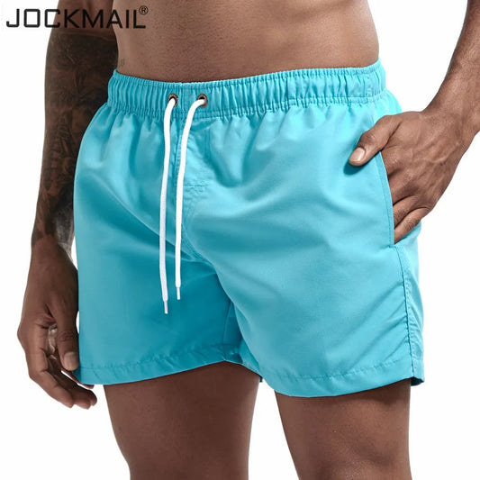 JOCKMAIL Men's Board Shorts Fast Dry 2020 Summer Holiday Beach Surf Pocket Swimming Trunks Sport Running Hybird Shorts